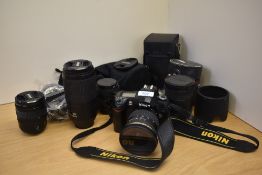 A Nikon D70s camera with Tamron SP AF Aspherical DiII 1:4,5-5,6 11-18mm A13 lens, a Sigma AF Macro