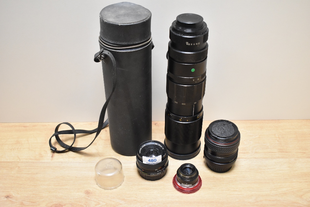 Four various lenses. A Tokina SD 1:3,5-4,5 28-70mm, a Yashica Auto Zoom 1:2 50mm, a Yashinon Auto