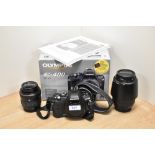 A boxed Olympus E400 camera body with Zuika Digital 17.5-45mm 1:3,5-5,6 lens, and Zuika Digital 40-