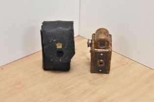 A Coronet Midget miniature camera in brown bakelite by Coronet Camera Company, Birmingham in