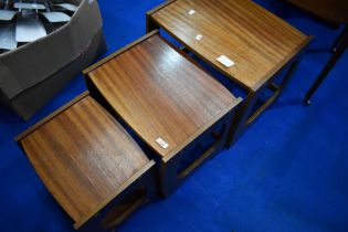 A vintage G plan style nest of three tables