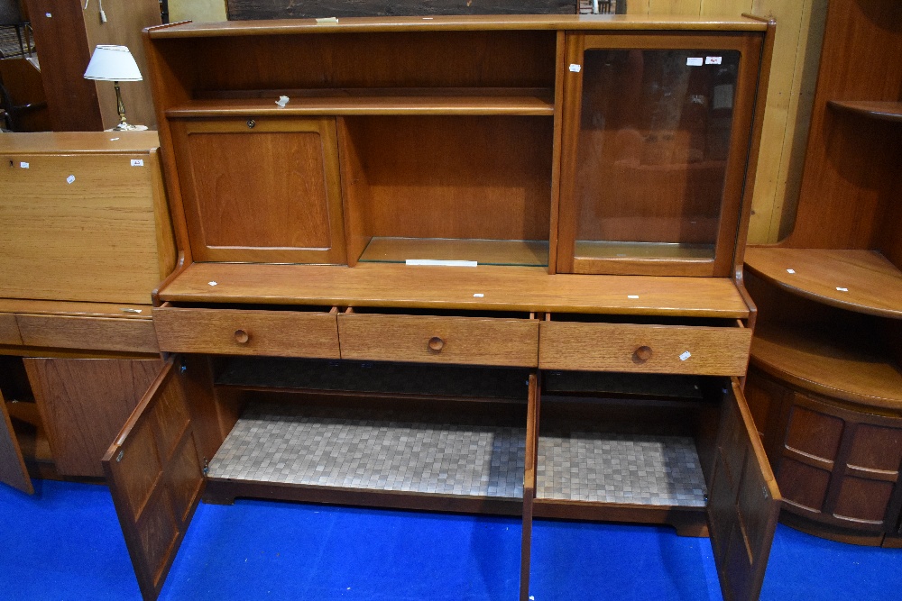 A vintage teak sideboard/dresser by Nathan, having cocktail and display section over triple frieze - Image 2 of 4