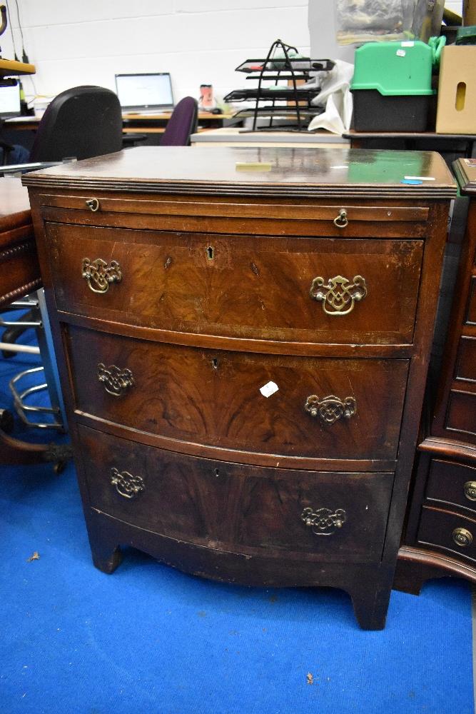 A reproduction dwarf chest of bow fronted drawers, approx. Dimensions W59 D43 H78cm