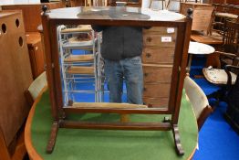 An early 20th Century mahogany frame toilet mirror, width approx 56cm