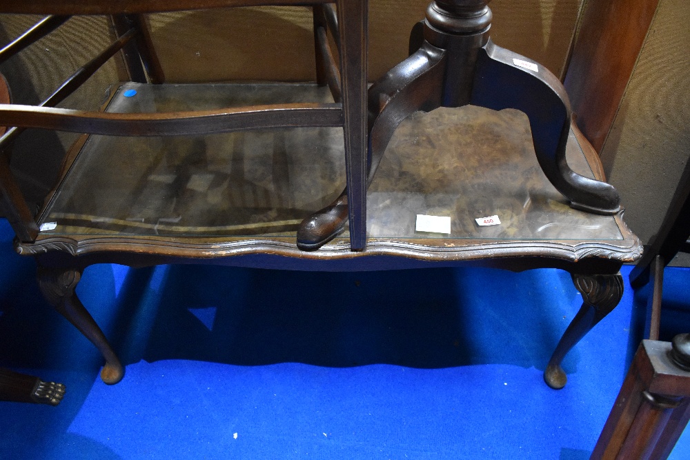 A reproduction coffee table having glass inset top, approx. 53 x 97cm