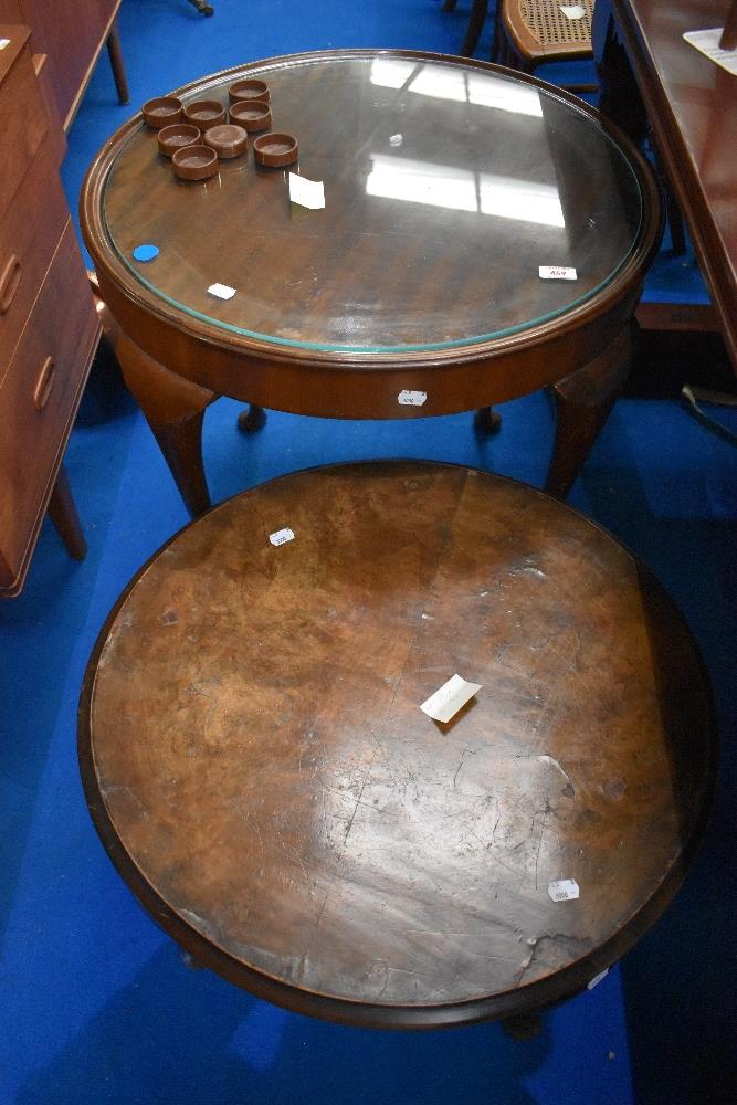 Two early to mid 20th Century mahogany and walnut occasional tables (both 63cm diameter)