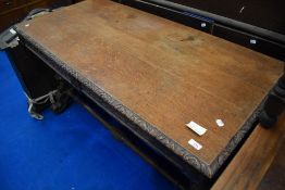 A 19th Century oak console or sofa table having carved edge and frieze, approx 131 x 62cm