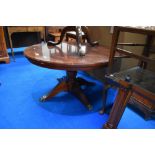 A reproduction Regency style circular coffee table, diameter approx. 99cm