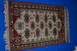 A Persian style rug, approx. 124 x 77cm