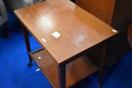 A vintage teak fold over tea trolley, width card table top, labelled Eastcraft , similar to