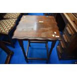 An early 20th Century oak occasional table having twist frame, approx 51 x 51cm