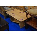 A modern light wood coffee table, of similar design to lots 629 & 630, approx. 129 x 70cm