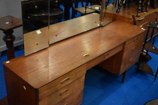 A vintage teak dressing table, width approx 112cm