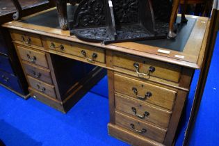 A traditional mahogany pedestal desk of Victorian design having skiver top, dimensions approx.