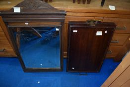 A Victorian stained frame mirror and a butlers tray table