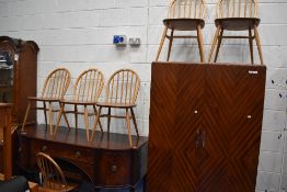 A set of six light Ercol hoop and stick back kitchen dining chairs