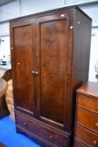 A modern mahogany wardobe with drawer base , dimensions approx. H199 W107cm