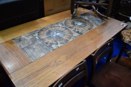 A vintage teak and tile dining table , approx 161 x 91cm, plus 2 50cm extensions to ends