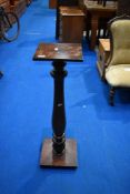 A 19th Century and later mahogany torchere, height approx 91cm