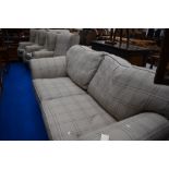 Three modern wing back easy chairs and settee in similar cream check upholstery, settee width approx