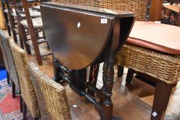 A nice quality reproduction oak gateleg occasional table , Sutherland style, approx 74cm opens to