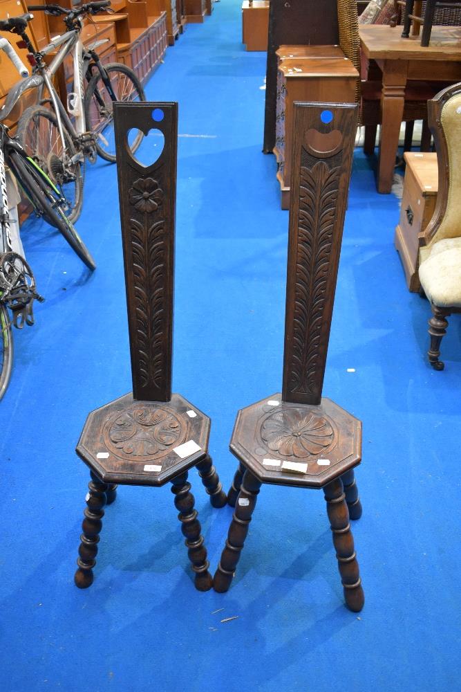 Two traditional carved oak spinning chairs