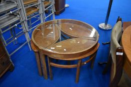 A vintage Nathan 'petals' teak and glass top coffee table nest , diameter approx. 82cm