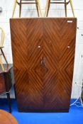 An Art Deco feathered mahogany gents wardobe, by Maple & Co having fitted interior, dimensions