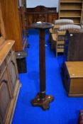 A 19th Century mahogany torchere, height approx. 126cm