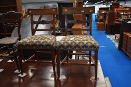 A pair of 19th Century railback dining chairs with later woolwork seats