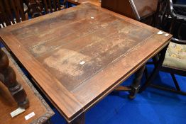 An early 20th Century oak drawer leaf dining table , closed size approx 92 x 92cm