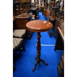 A reproduction light mahogany jardiniere stand, height approx. 102cm