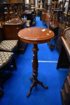 A reproduction light mahogany jardiniere stand, height approx. 102cm