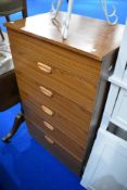 A vintage laminate bedroom chest of five drawers, labelled Schreiber, dimensions approx W61 D43