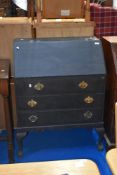 A traditional dark stained bureau