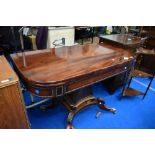 A William IV mahogany fold over tea/breakfast table of large proportions , having curved top over