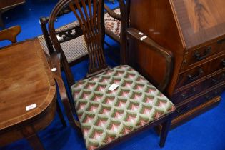 A stained frame carver chair with woolwork upholstered seat