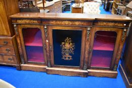 An impressive 19th Century Credenza having inlay decoration to frieze and ebonised central door
