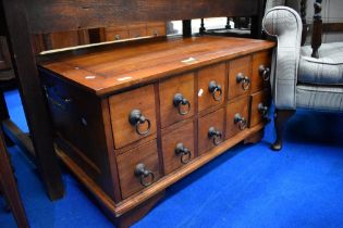 A modern coffee table having merchants style drawers, approx dimensions. W92 D58 H50cm