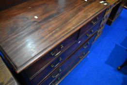 A 19th Century mahogany chest of two over three long drawers having Georgian brass handles, approx