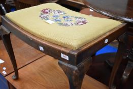 Two early 20th Century dressing table stools, on cabriole legs