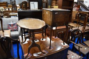 An early to mid 20th Century walnut coffee table and sewing table