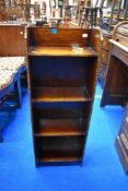 An early 20th Century oak narrow bookshelf, dimensions approx. H92 W33 D17cm