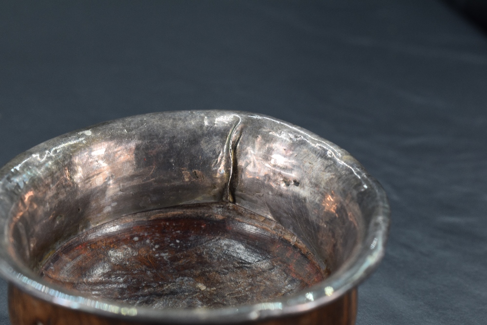 A 19th century Chinese/Tibetan white metal mounted Mazer bowl, of turned form with white metal - Image 3 of 4