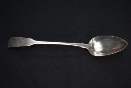 A George III silver Fiddle pattern basting spoon, marks for London 1818, maker WE, marks similar