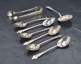 A set of six Edwardian silver coffee spoons, with shaped and bright-cut handles, together with