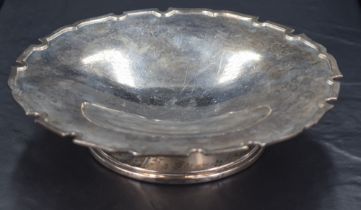 A George VI silver footed dish, of circular form with Chippendale inspired moulded edge detail,