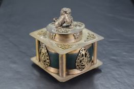 A Chinese gilt white metal and green hard stone censer, of square outline with circular temple