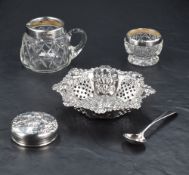 An Edwardian silver bon bon dish, of shaped octagonal form with embossed foliate and scallop shell