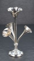 An Edwardian silver four-branch epergne, the large central and three smaller shaped trumpets